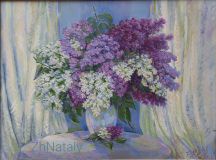 A bouquet of lilacs by the window