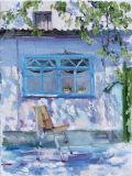 "Casa de un artista con una ventana azul"