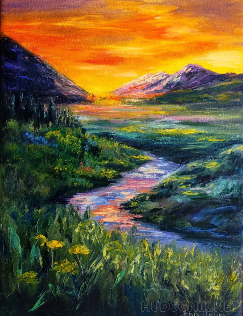 Atardecer naranja en las montañas