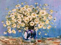 Daisies in a glass vase