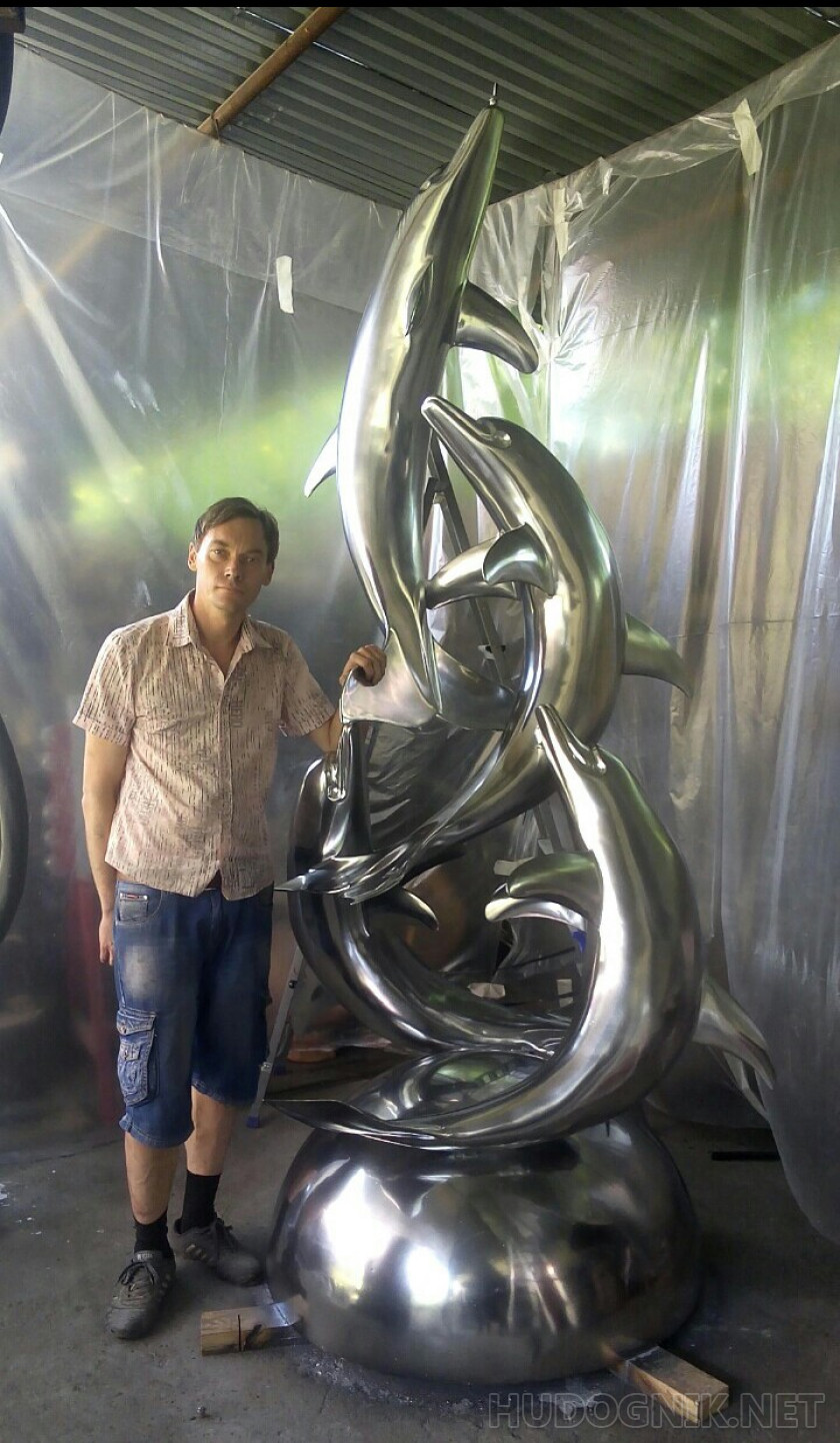 Sculptural composition of four dolphins. Electroplating.