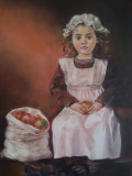 Girl in a cap with a bag of apples