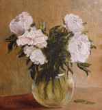 Peonies in a glass vase