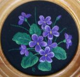 Una miniatura de "la Violeta" (redondo)