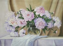 Peonies in a glass vase.