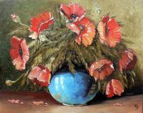 Poppies in blue vase