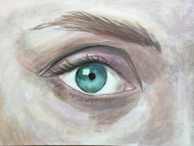 Один обнаженный зеленый женский глаз