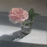 A rose in a glass