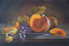 Calabazas, uvas y limón