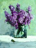 Bouquet of lilacs and bronze beetle