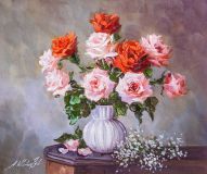 Bouquet of pink and coral roses in a vase